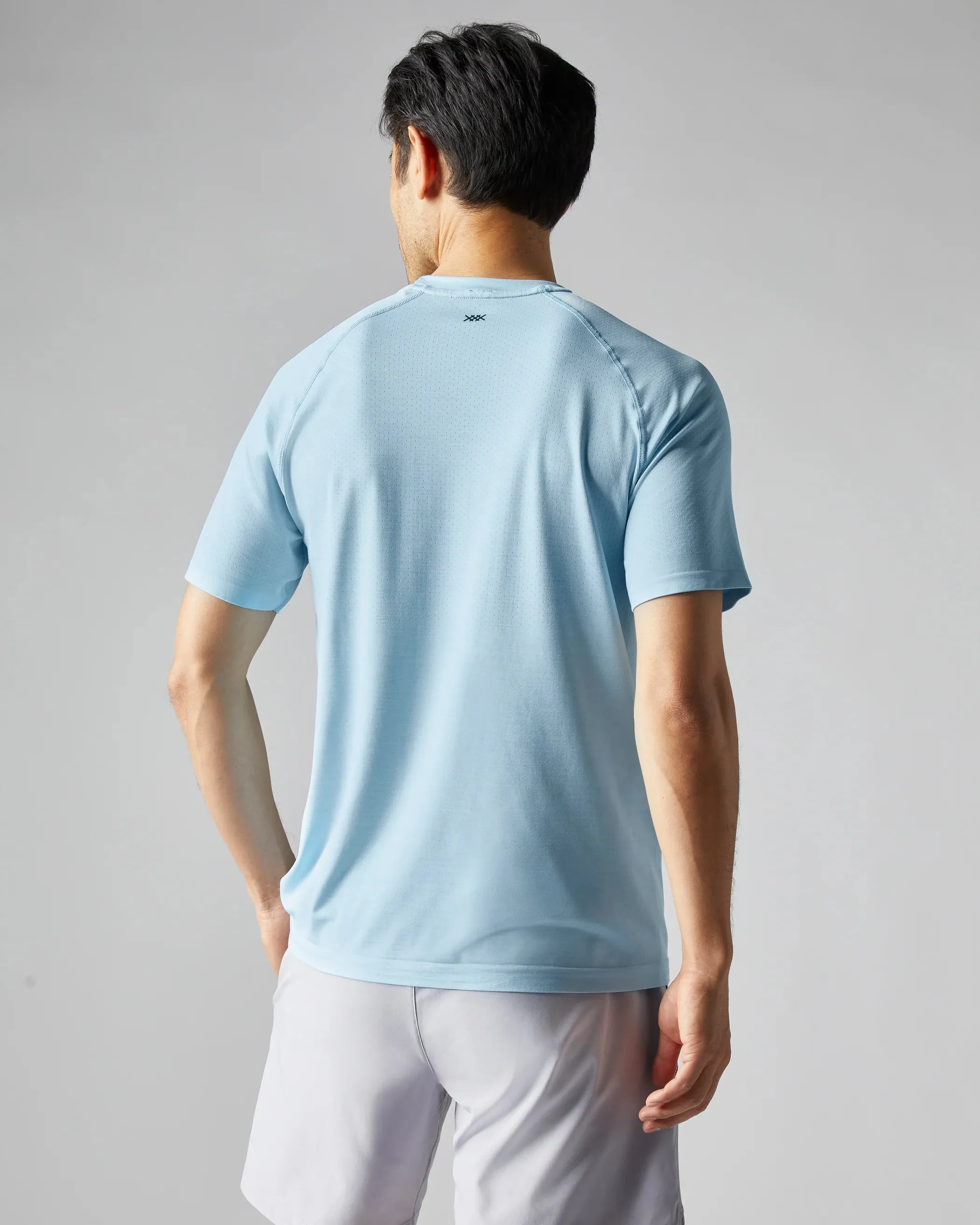 RHONE REIGN SHORT SLEEVE VAPOR TRAINING TOP - SKY BLUE